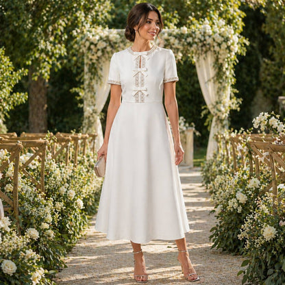 ESTELLE  | BOW  MIDI DRESS